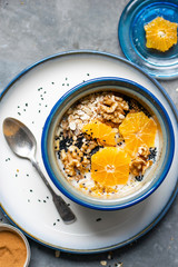 Orange breakfast bowl preparation