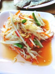 close up top view papaya salad or Som tam in Thai street food