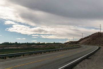highway or road in north washington USA with cloudy sky.