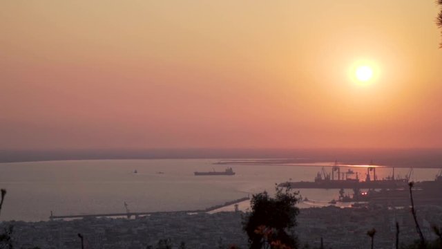Thessaloniki / Greece 22 march 2019 : sunset pan in the most beautiful city of Greece photo taken from the hilltop forest Kedrinos Lofos, also known as Seich Sou,the temperture is fine for a walk