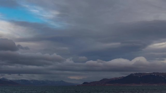 Tlmelapse of altocumuls, cumulus and several other cloud formations above the Atlantic ocean and Esja mountain.
Reykjavik, Iceland.
