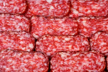 Sausage, sliced, tasty food, a popular snack. Sausage-a popular food product, minced meat in a shell. Contains one or more types of meat and various fillers, subjected to heat treatment: cooking, roas