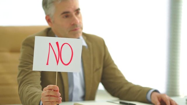 The man is interviewing in the office. slow motion