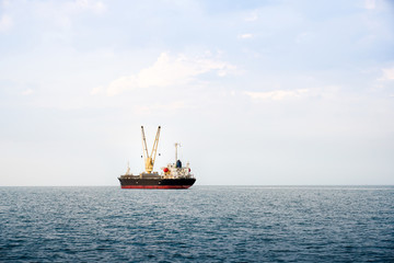 Logistics and transportation of International Container Cargo ship in the ocean, Chonburi, Thailand.