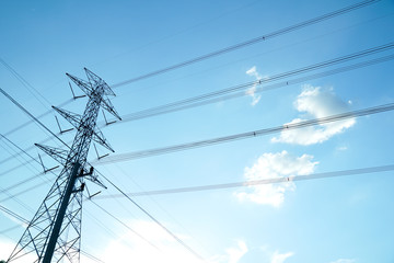 Fototapeta premium High voltage post. High voltage tower sky background.