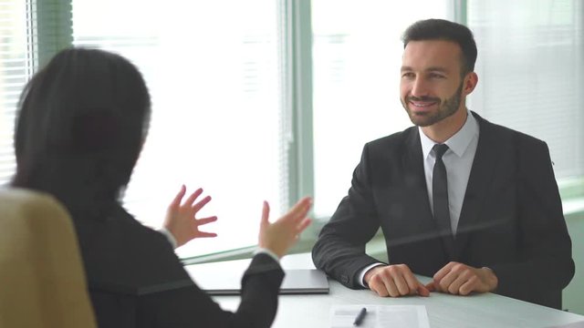 The man and woman hold a business meeting. slow motion