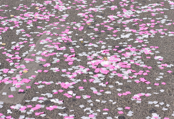 Small square paper confetti on the ground