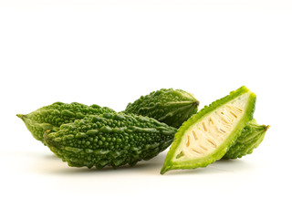 Fresh bitter gourd on white background.