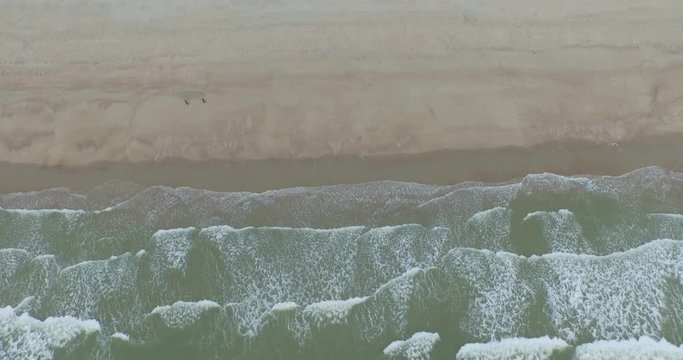 Aerial: An overcast day at the sand beach between Domburg and Westkapelle, the Netherlands.
