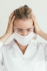 Female Scientist Having a Headache - COVID-19 coronavirus pandemic themed