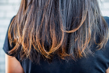 closeup woman damaged hair split ends 