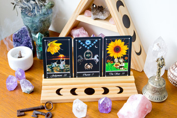 Tarot Cards on stand in Altar space with Moon phase design - obrazy, fototapety, plakaty