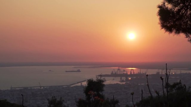 Thessaloniki / Greece 22 march 2019 : sunset zoom in the most beautiful city of Greece photo taken from the hilltop forest Kedrinos Lofos, also known as Seich Sou,the temperture is fine for a walk