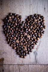 coffee beans arranged in the shape of a heart