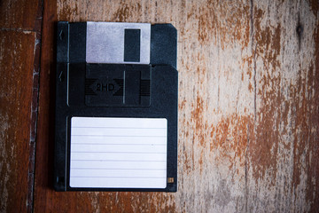 floppy disk on wood backgrounds