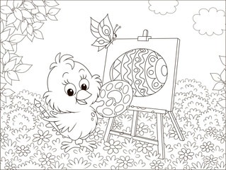 Little chick drawing a decorated Easter egg among flowers on grass of a lawn on a sunny spring day, black and white vector illustration in a cartoon style for a coloring book
