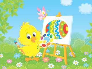 Little yellow chick drawing a colorful Easter egg among flowers on green grass of a lawn on a sunny spring day, vector illustration in a cartoon style