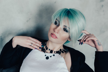 girl with colored hair in strict