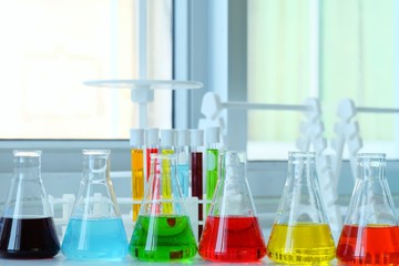 Chemical tube set development and pharmacy in laboratory  with multicolored substances in laboratory - Image