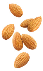 Flying almonds, isolated on white background