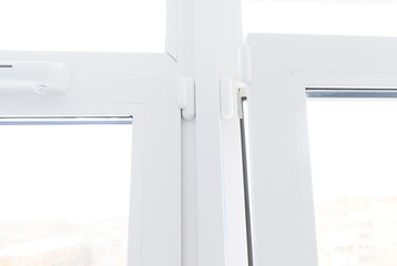 security system on the windows. Male hand opens a window. Smart home