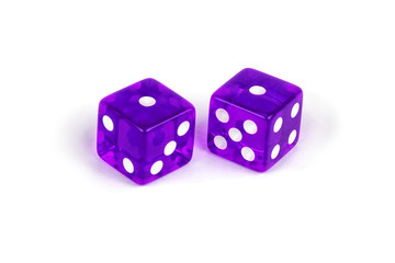 Two purple glass dice isolated on white background. One and one