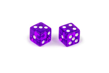 Two purple glass dice isolated on white background. Three and four.