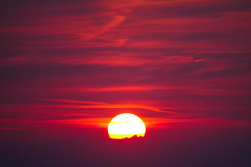 Colorful sky and golden sun on a tranquil summer morning in the untouched nature
