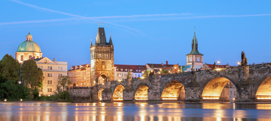 Scenic view Charles bridge and historical center of Prague, buildings and landmarks of old town at sunset, Prague, Czech Republic