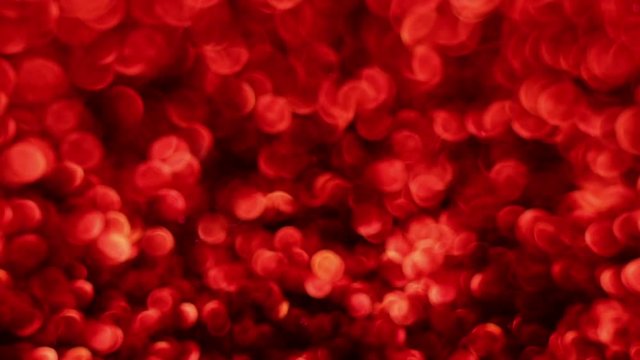 Red Merry Christmas magical bokeh lights background. Glamour happy valentines day walpaper.