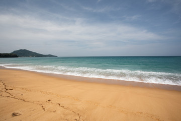 Fototapeta na wymiar Empty tropical beach background. Horizon with sky and white sand