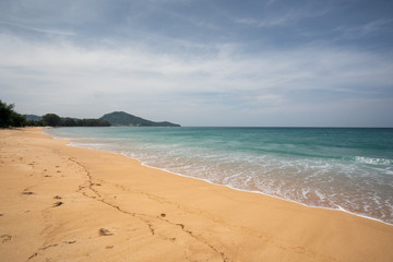 Fototapeta na wymiar Empty tropical beach background. Horizon with sky and white sand