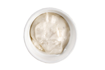 yogurt cream sauce in a bowl on white background. One of the collection of various sauces.