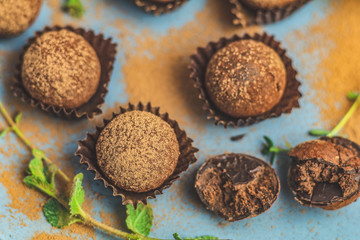 handmade chocolate balls cakes in a blue tray
