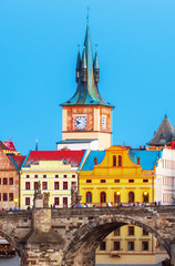 Obraz premium Scenic view Charles bridge and historical center of Prague, buildings and landmarks of old town at sunset, Prague, Czech Republic