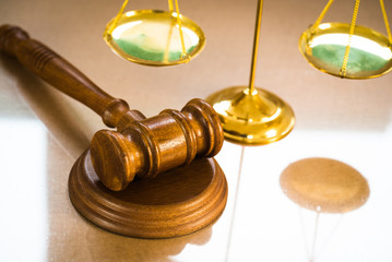 Law and Justice concept on wooden background