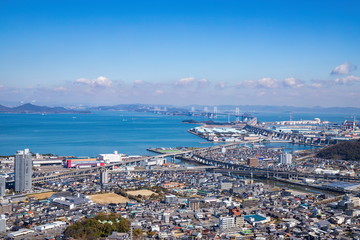 Obraz premium Cityscape of utazu town and Seto ohashi bridge in the seto inland sea ,Shikoku,Japan