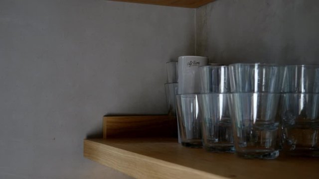 glass taken form shelf.