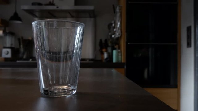 glass being put on bar