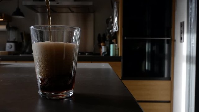 soft drink cola poured in glass