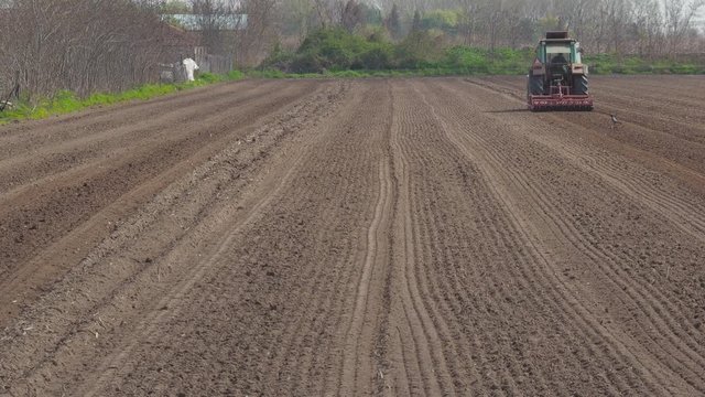 Farmer prepare his field to sow the seed 4