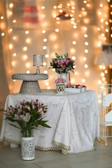 Table and flowers in the style of Shabby chic