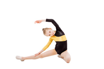 Cute little girl sits on a splits. People, action.
