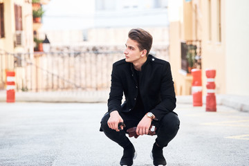 Handsome young man in black