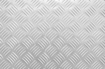 Decorative metal surface with ornaments in black and white