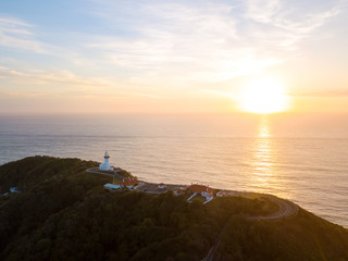 Byron Bay lighthouse at sunrise from an aerial view