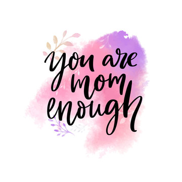 You are mom enough. Support quote, inscriprational saying. Modern brush calligraphy on watercolor paint wash.