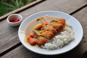 Tonkatsu, deep fried pork cutlet topped with Japanese curry sauce