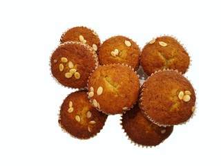 Top view of Banana cupcake with currant and slice almonds on top isolated on white background, Cake koy hom  is Thai traditional