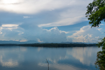 Blue sky high peak mountains fog hills mist scenery river lake dam bay gulf wildlife  National park views Kanchanaburi, Thailand.
